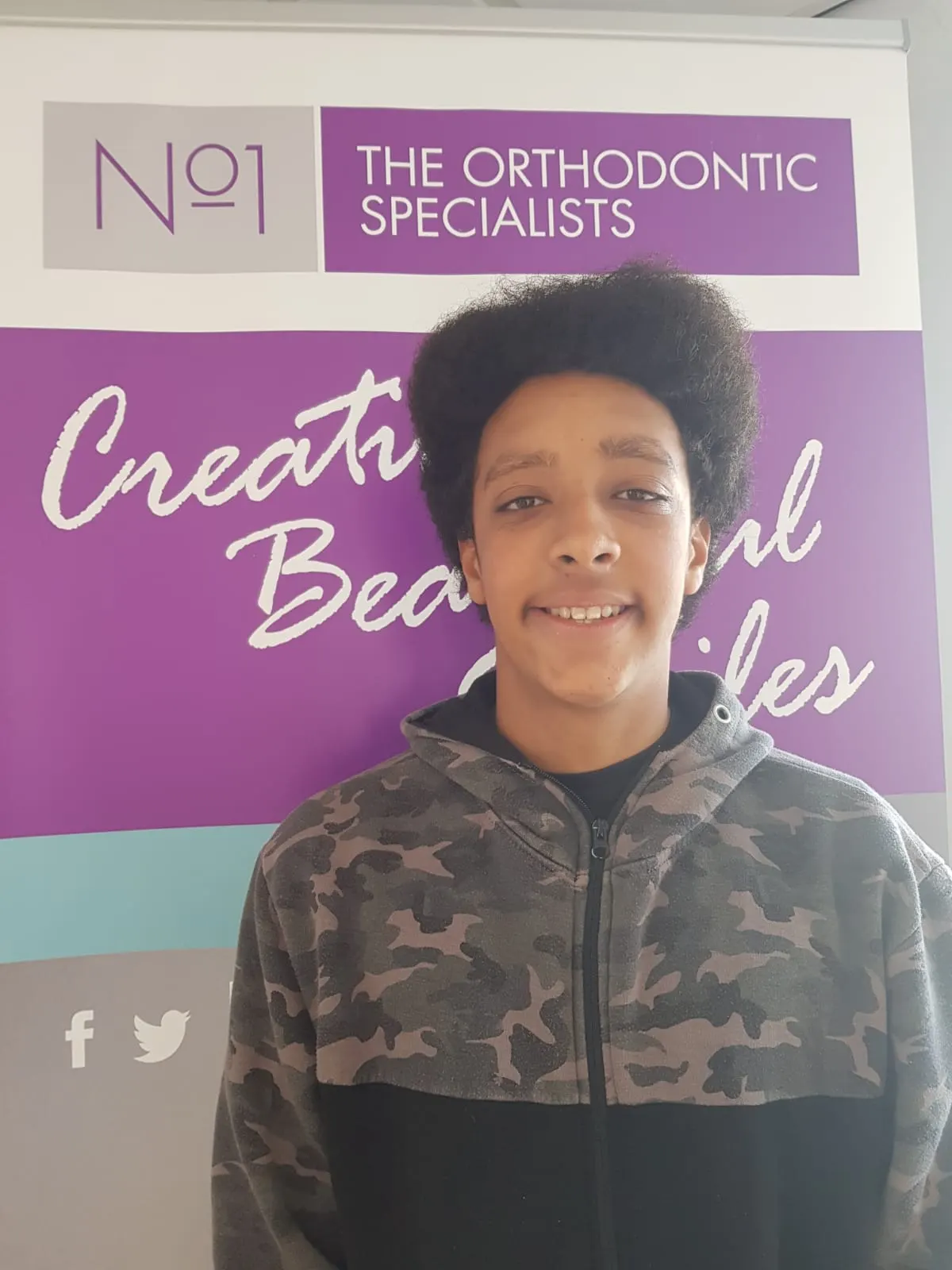 A patient smiling after treatment with fixed braces at No1 (11 of 38)