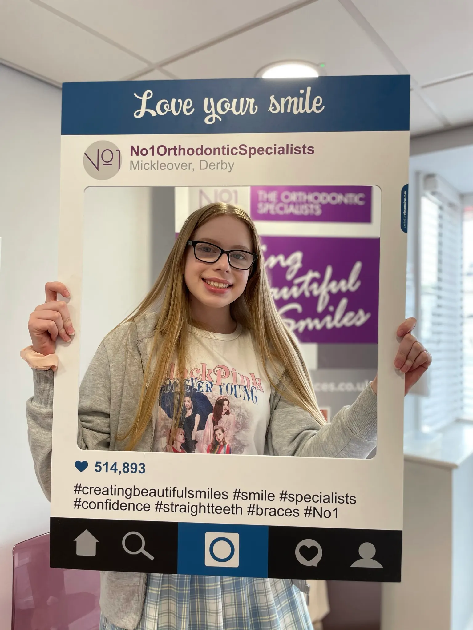 A patient smiling after treatment with fixed braces at No1 (12 of 38)