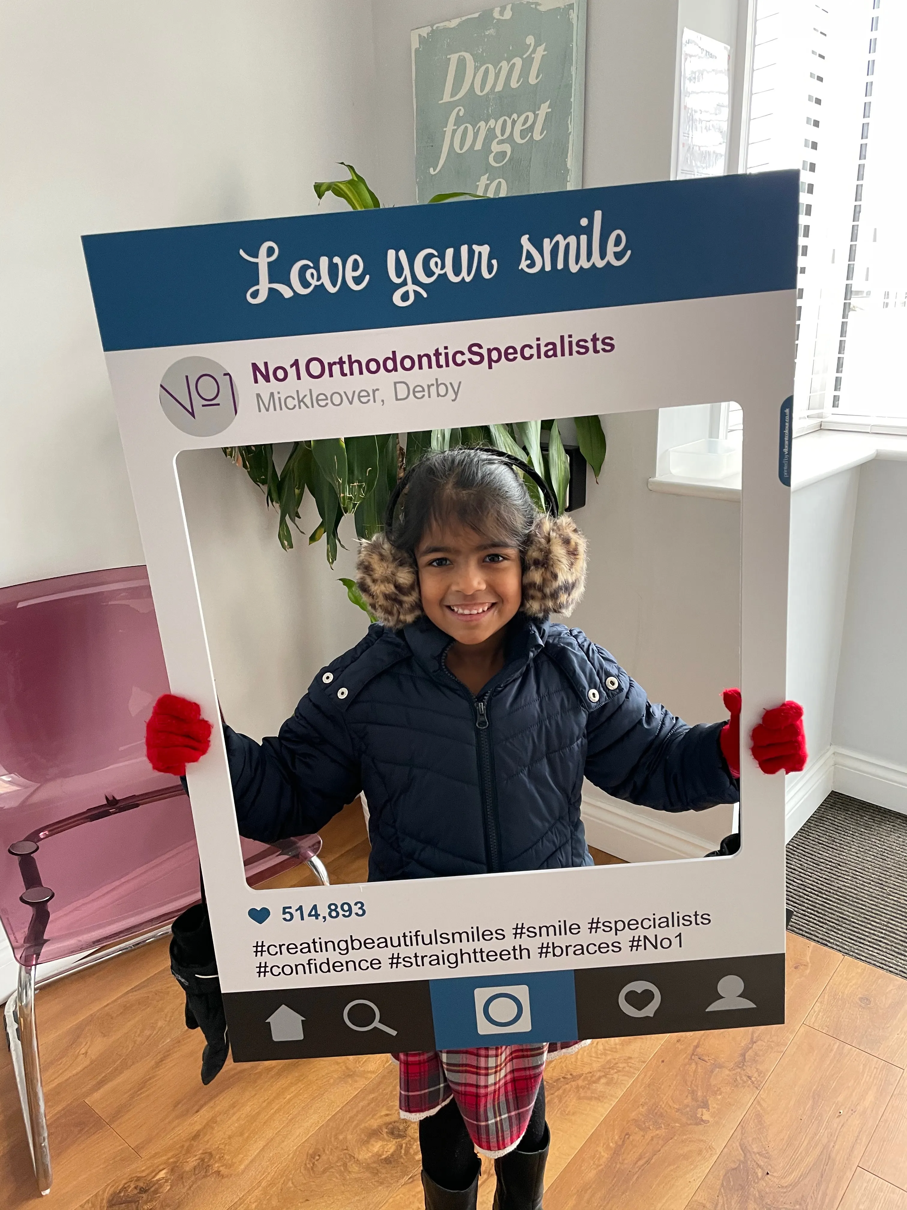 A patient smiling after orthodontic treatment at No1 (13 of 38)