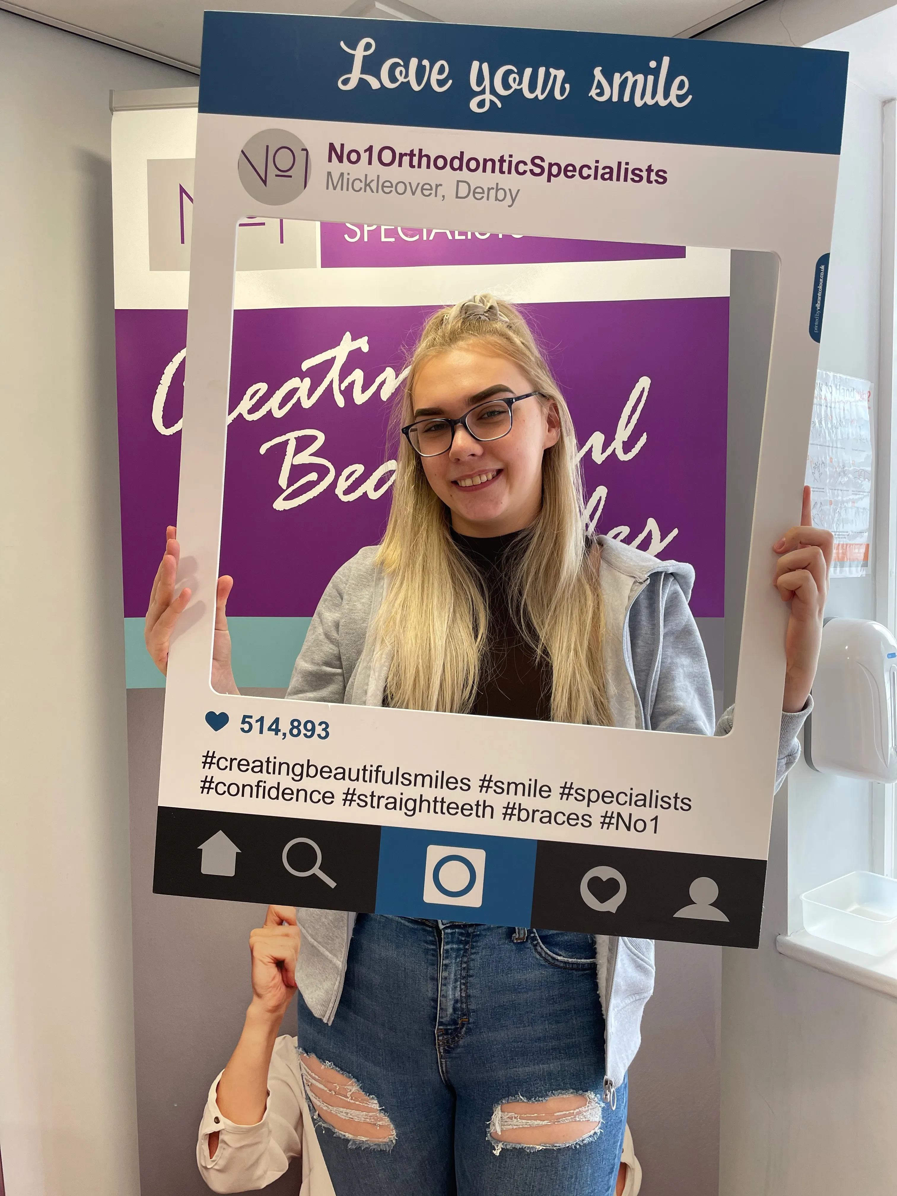 A patient smiling after orthodontic treatment at No1 (16 of 38)