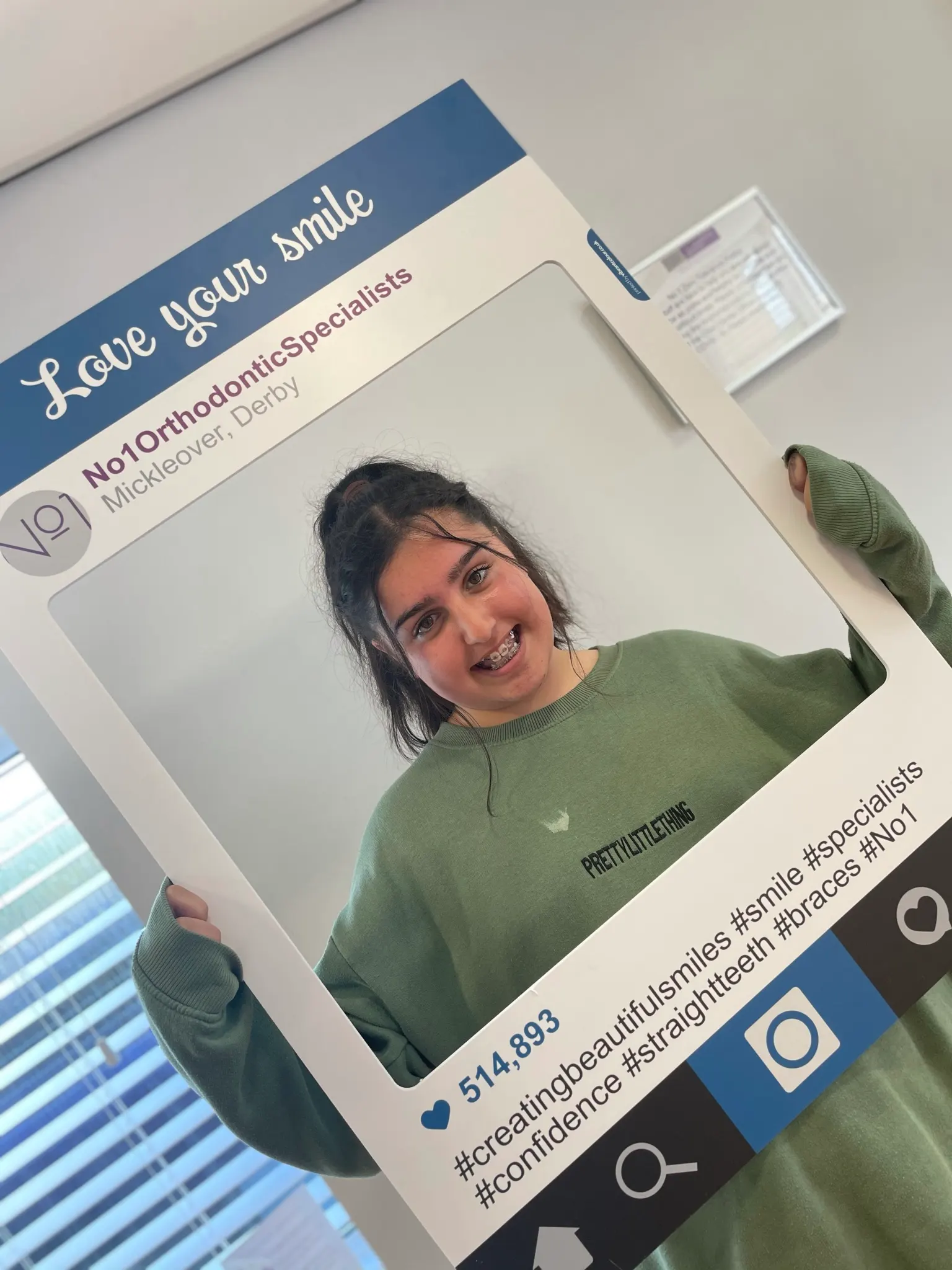 A patient smiling after orthodontic treatment at No1 (17 of 38)