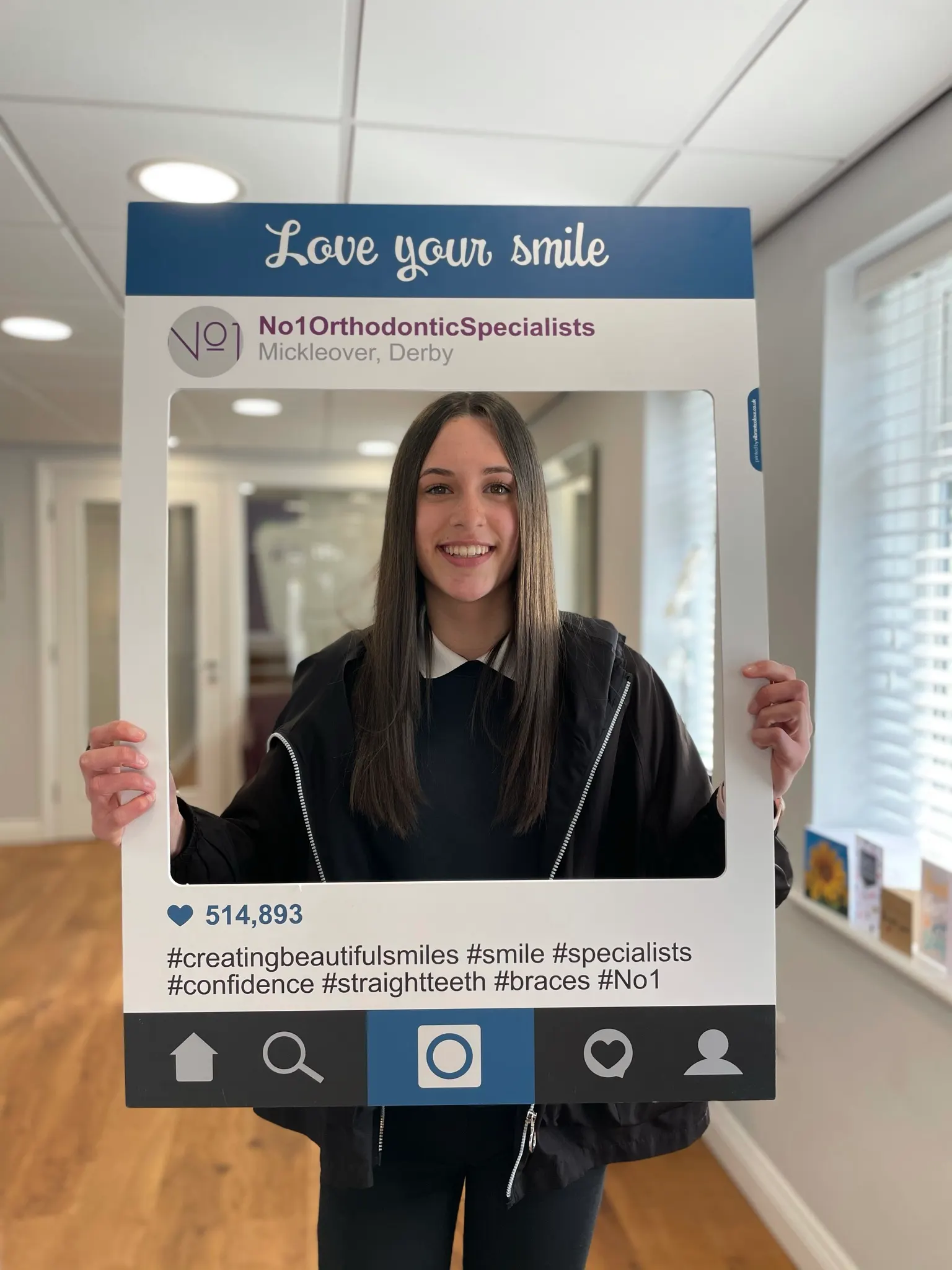 A patient smiling after orthodontic treatment at No1 (18 of 38)