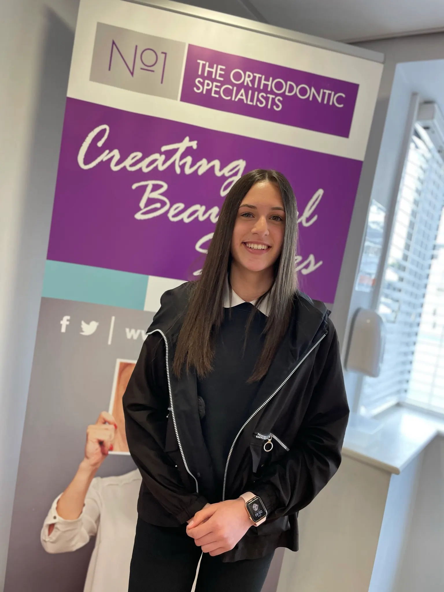 A patient smiling after orthodontic treatment at No1 (19 of 38)