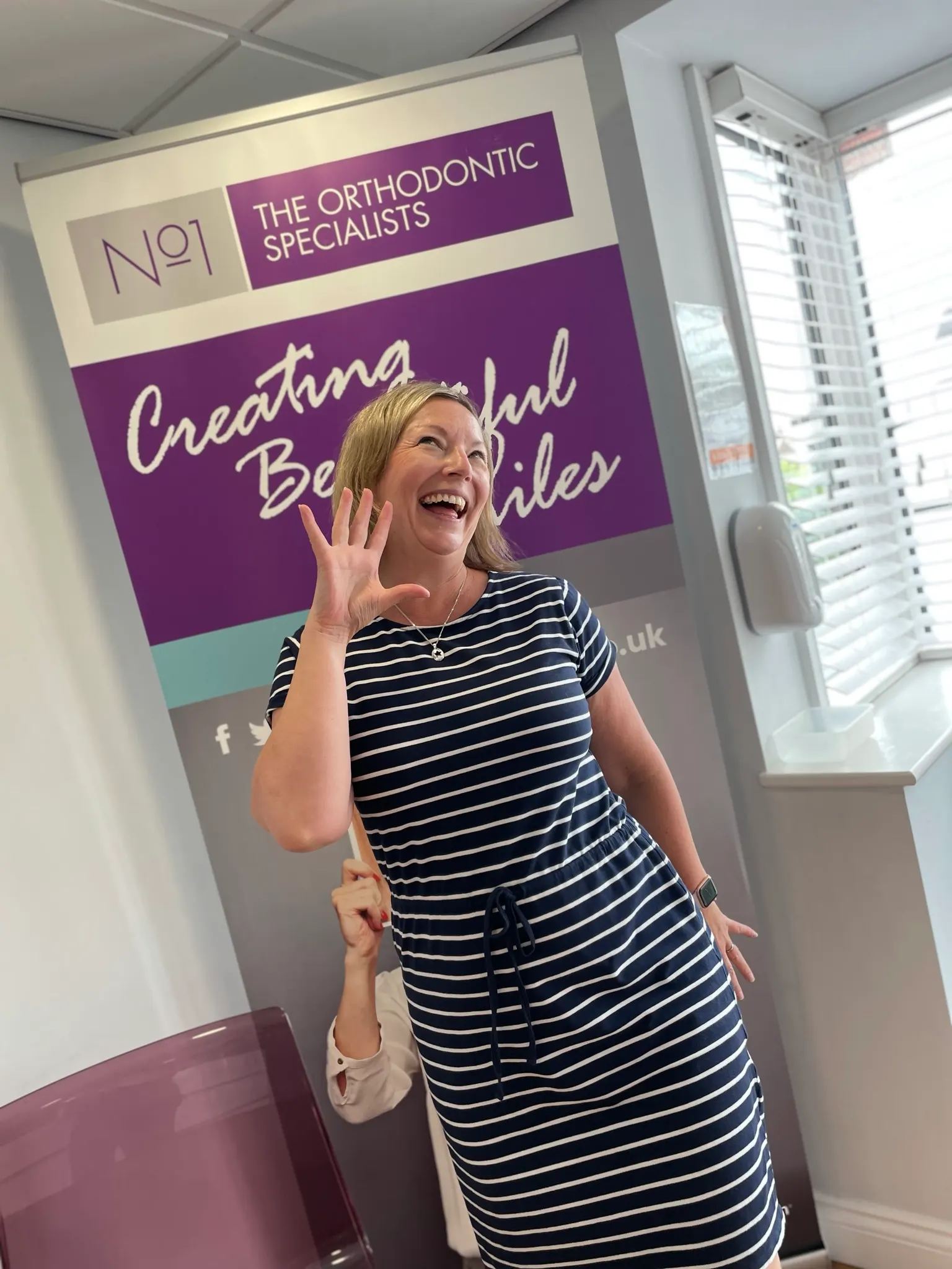 A patient smiling after orthodontic treatment at No1 (24 of 38)