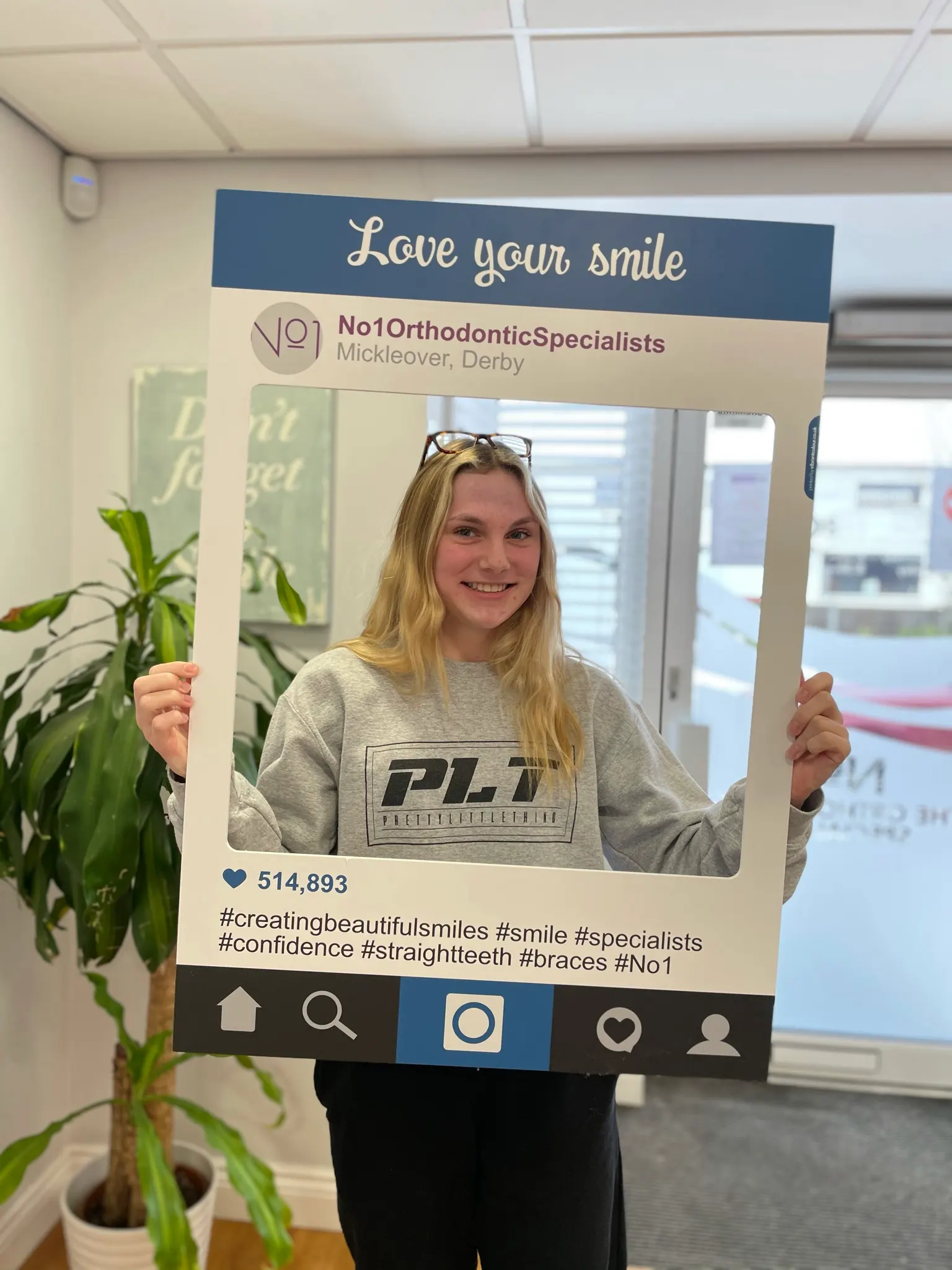 A patient smiling after treatment with twin blocks and fixed braces at No1 (30 of 38)