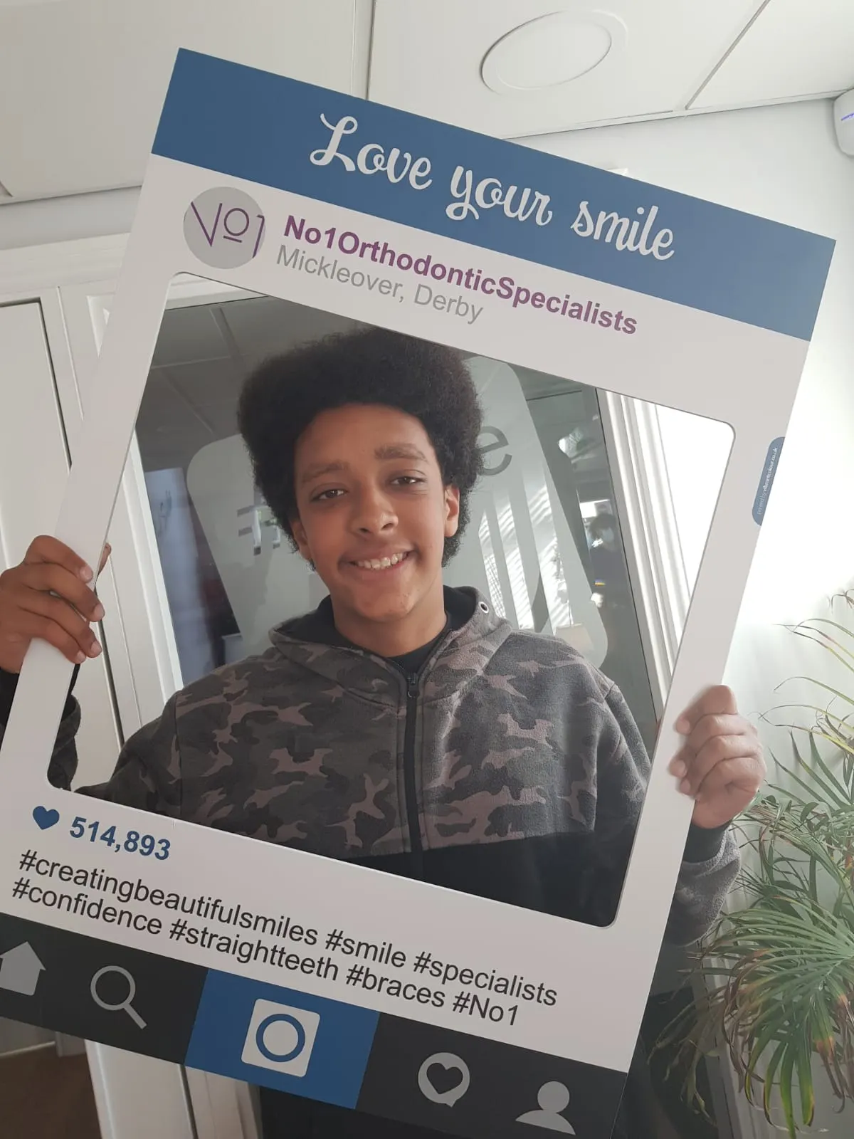 A patient smiling after orthodontic treatment at No1 (32 of 38)