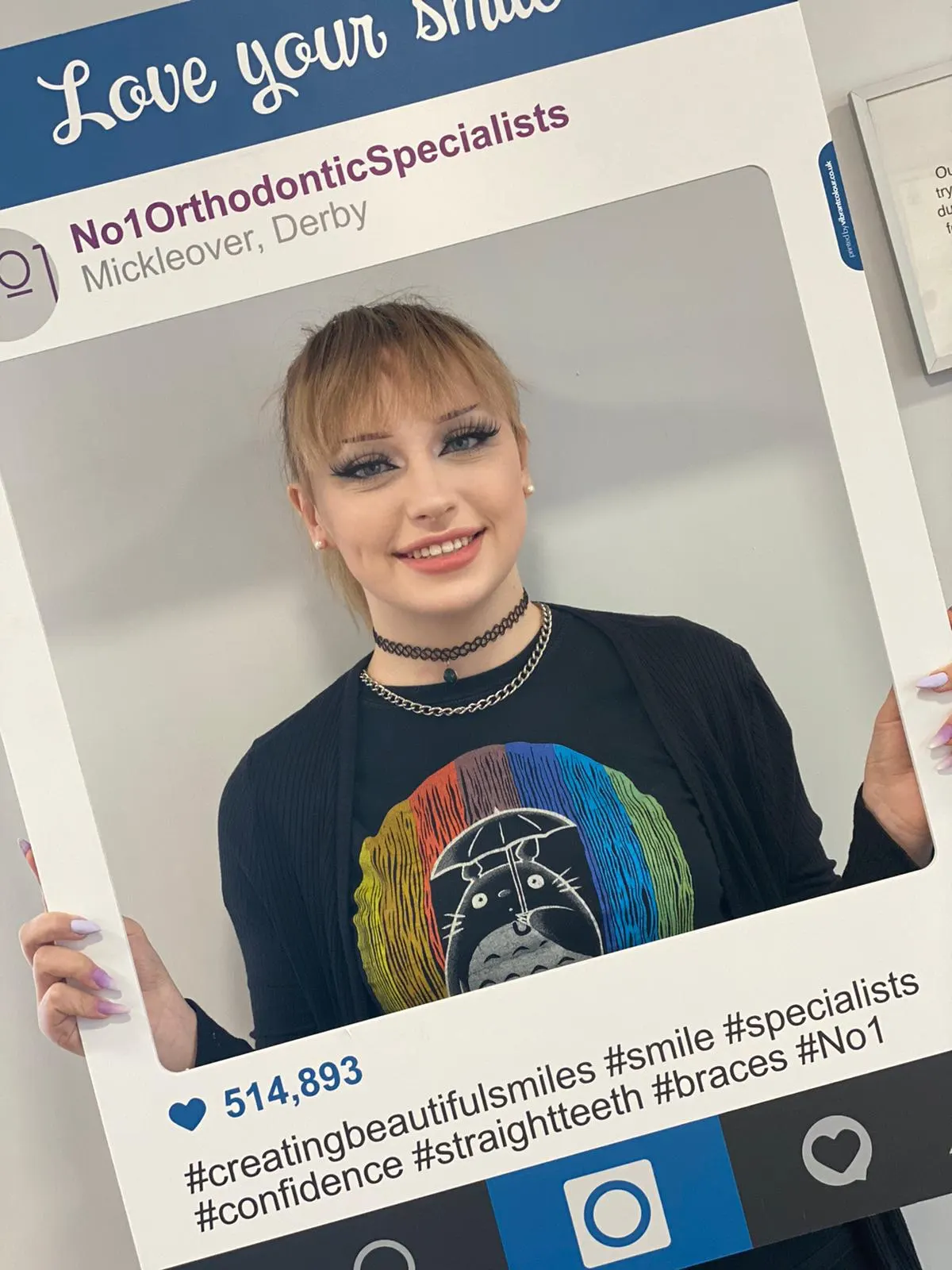 A patient smiling after orthodontic treatment at No1 (9 of 38)